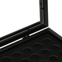 Open zwarte lijst met kliksluiting, toont perforaties voor capsules.