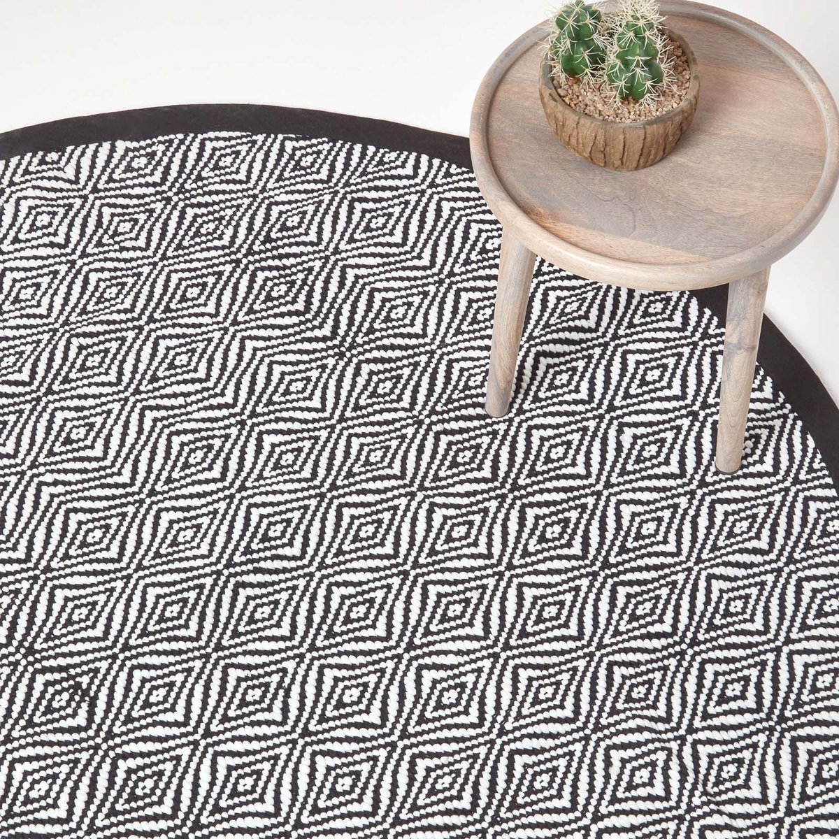 Homescapes rond vloerkleed Trance zwart-wit patroon, 150 cm gemaakt van gerecyclede vezels