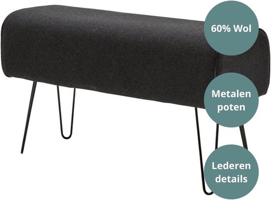 Pouffe gris foncé avec pieds compas en métal et détails en cuir. 60% laine.