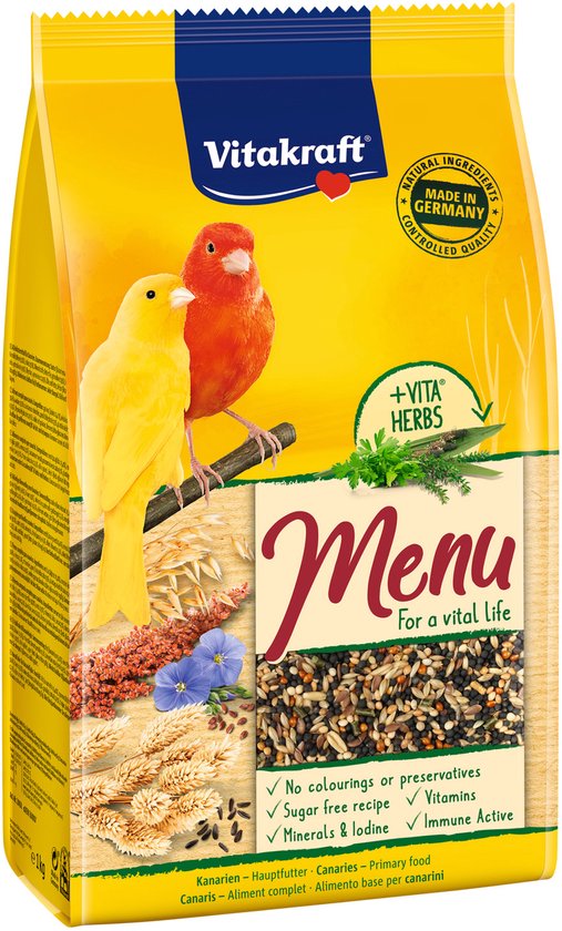 Gele en rode kanarie op gele zak met Vitakraft Menu voor een vitaal leven, +VITA HERBS en ingrediënten.