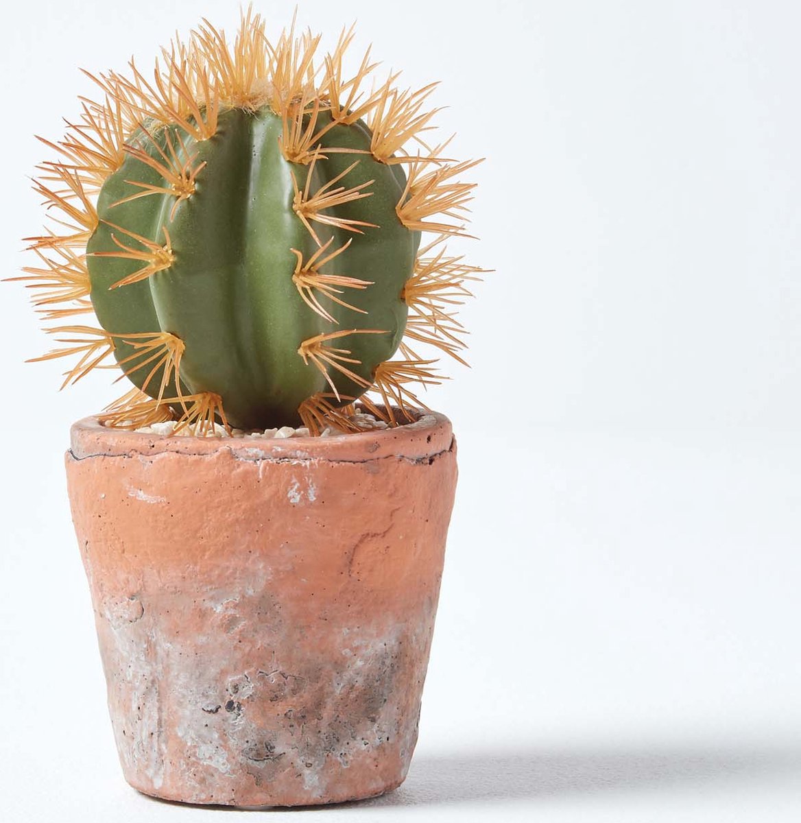Homescapes Kleine kunstcactus met oranje doornen in een terracotta pot, 15 cm hoog Groen