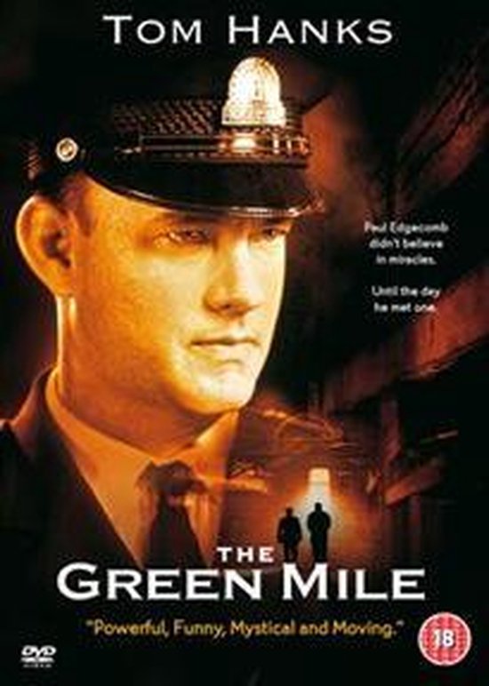Filmcover van "The Green Mile" met Tom Hanks in uniform en pet. Tekst: "TOM HANKS", "THE GREEN MILE", keurmerk 18.
