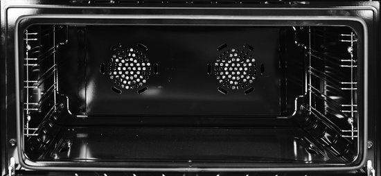 Binnenkant van de oven van een zwart gasfornuis met ventilatieroosters.