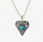 Fashionidea - Mooie zilverkleurige ketting met grote turquoise hart hanger