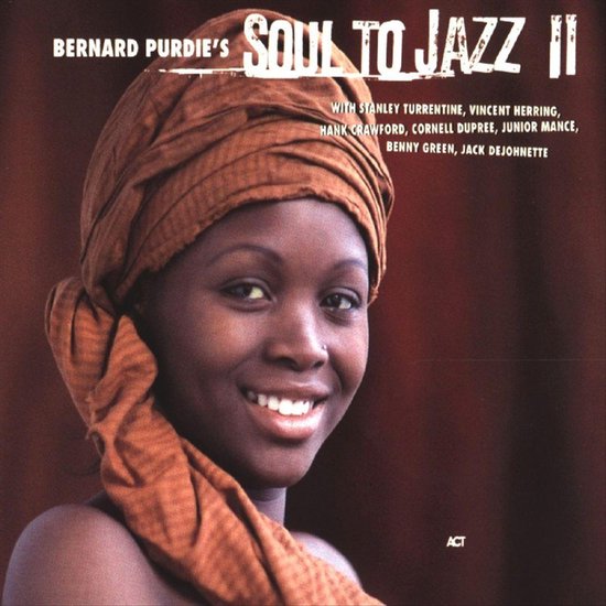 Bernard Purdie's Soul to Jazz II albumcover met een lachende vrouw met een oranje hoofddoek.