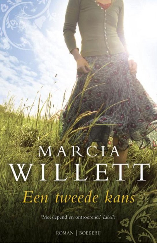 Boekomslag van 'Een tweede kans' van Marcia Willett. Een vrouw draagt een groen vest en een lange, bloemige rok. Een titel en auteursnaam staan op de voorkant.