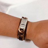 Fashionidea mooie zwarte leren armband met een grove goudkleurig schakel voorzien van blinkende sierstenen.