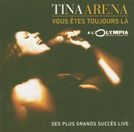 Tina Arena zingt live in L'Olympia met de tekst 'Vous êtes toujours là'