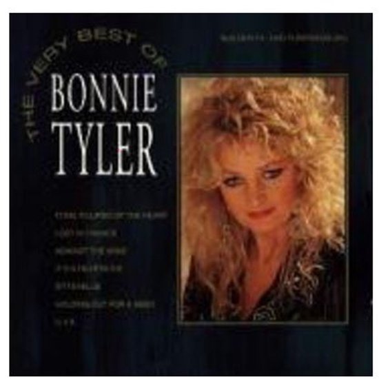 Pochette de l'album The Very Best of Bonnie Tyler avec Bonnie Tyler aux cheveux blonds et ébouriffés et fard à paupières bleu. Titre de chanson : Total Eclipse of the Heart.