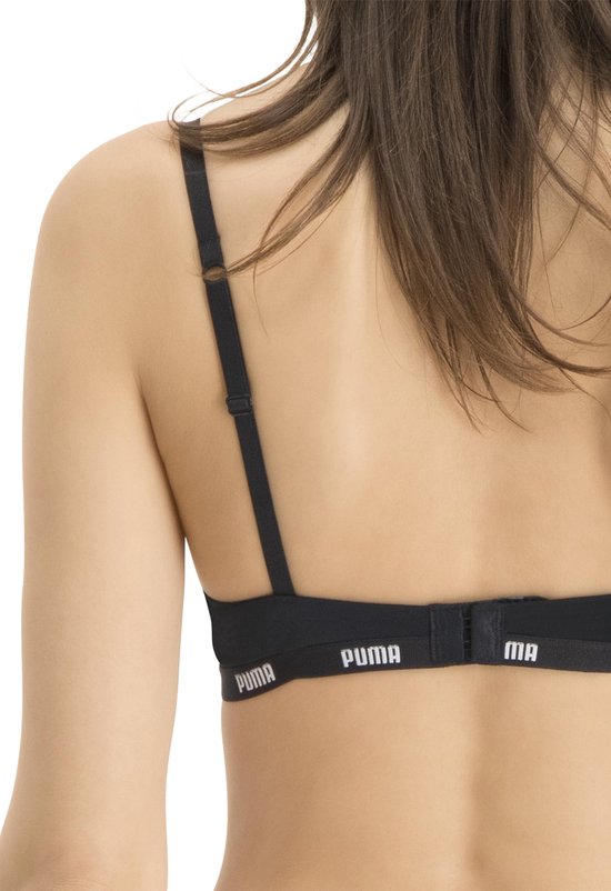 Zwarte push-up bh van Puma met logo band, op een model, achterkant