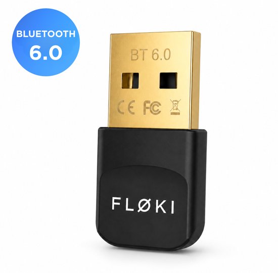 Gouden FLØKI USB-adapter met Bluetooth 6.0-aanduiding en "FLØKI" logo erop. In een blauwe cirkel staat "BLUETOOTH 6.0".