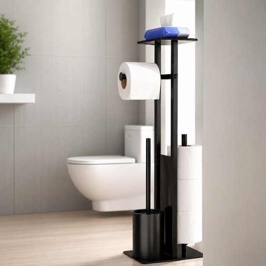 Zwarte, vrijstaande toiletrolhouder met toiletborstel en plankje met tissues, naast een wit toilet in een lichte badkamer.