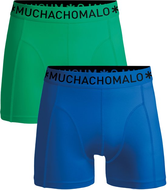 Twee Muchachomalo boxershorts, een groene en een blauwe, met zwarte elastische band met logo.