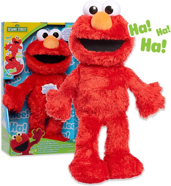 Pluche Kietel Mij Elmo in doos, met tekst 'Hee! Hee!' en 'Ha! Ha!' op de verpakking.