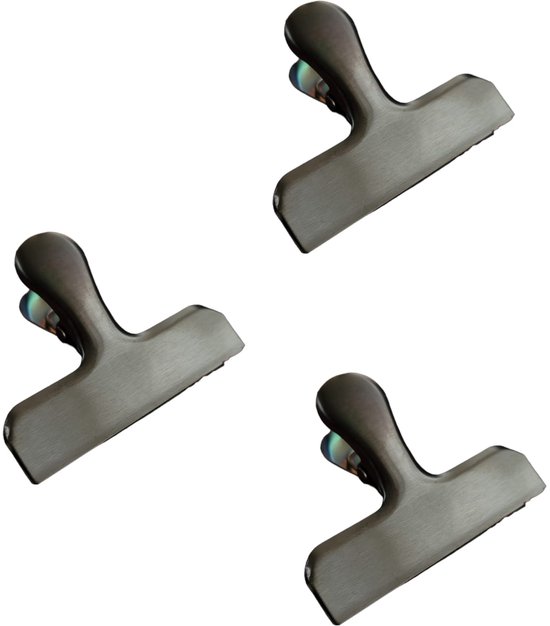 Drie zwarte metalen vershoudclips van 7,5 cm voor het luchtdicht afsluiten van verpakkingen.