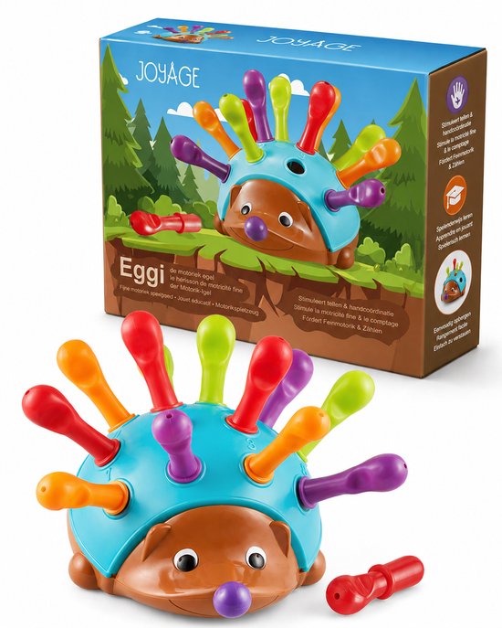 Speelgoed-egel met stekels in regenboogkleuren, op de doos staat 'Eggi de motoriek-egel'.