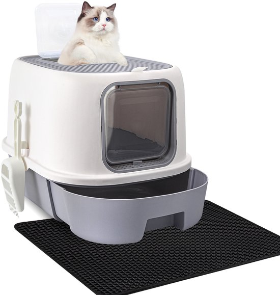 Een ragdollkat met blauwe ogen zit in een witte en grijze kattenbak, op een zwarte mat. De bak heeft een uittrekbare lade.