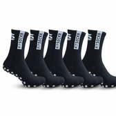 Vijf zwarte sportsokken met witte boord met logo en witte cirkelvormige gripzones op de zool.