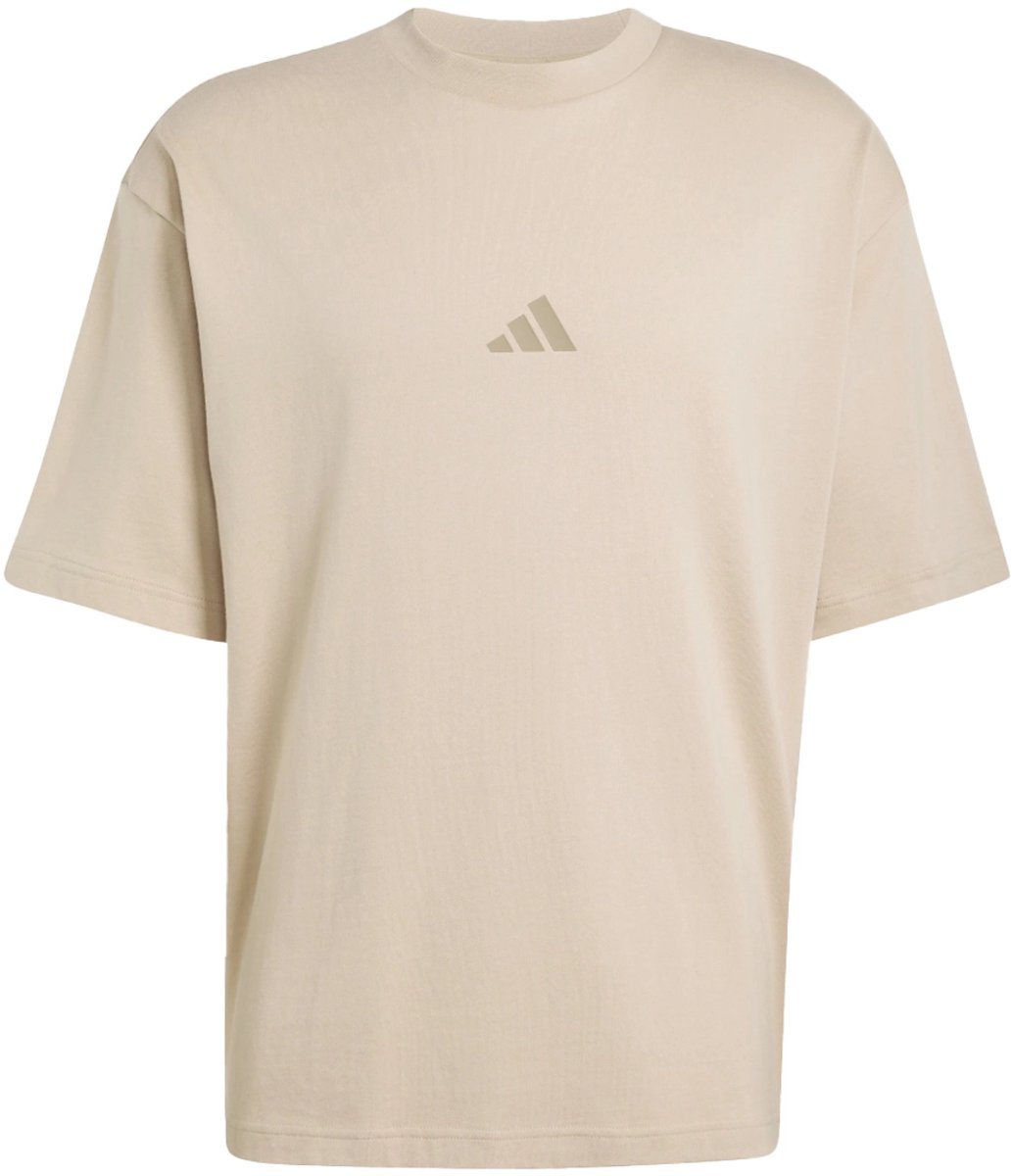 Adidas future icons small logo tee in de kleur ecru. Creme