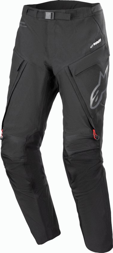 Zwarte Alpinestars motorbroek met grote reflecterende ster op de zijkant en rode trekkoorden.