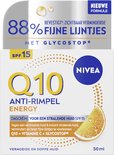 Nivea Q10 Energy dagcrème potje en doosje met sinaasappelschijfje, "88% fijnere lijntjes" en "Nieuwe formule".