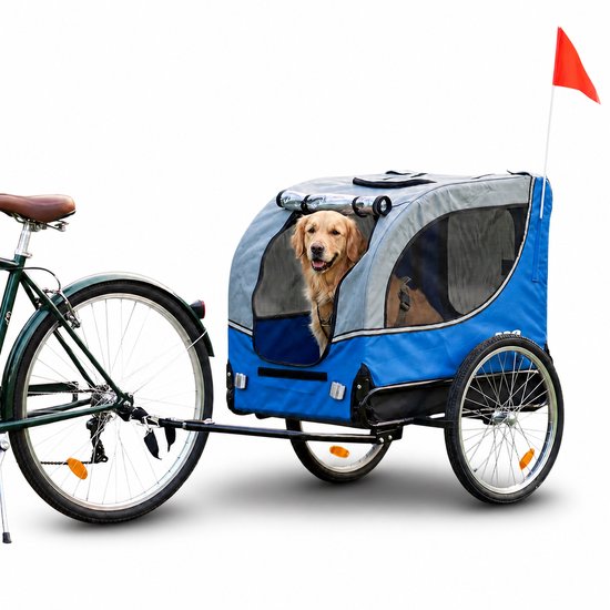 Hondenfietskar, blauw met grijs, met een golden retriever erin, bevestigd aan een fiets.