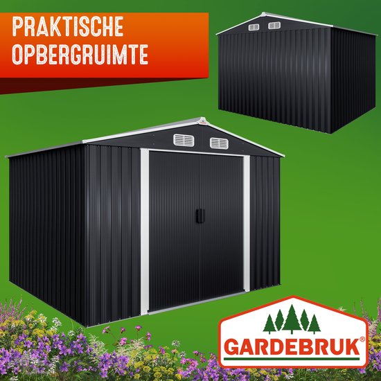 Zwarte berging met zadeldak, dubbele deuren en ventilatieroosters. "Praktische opbergruimte."