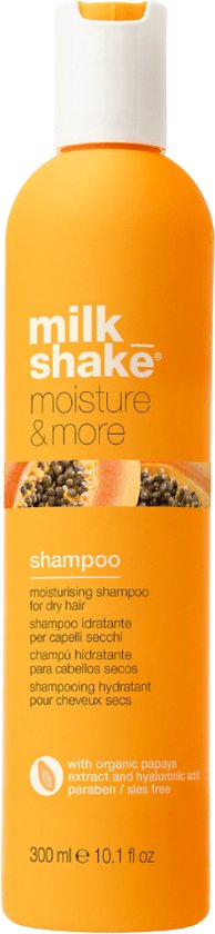 Oranje fles met melkshakembleem, met de tekst 'moisture & more shampoo for dry hair'.