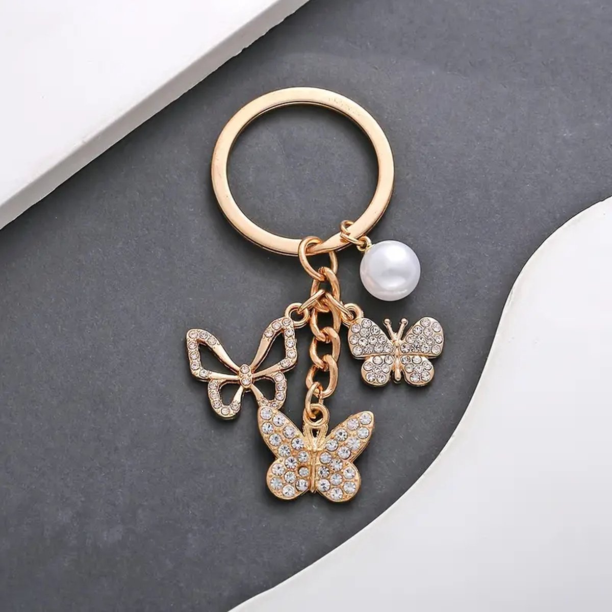 Sleutelhanger - Vlinders - Parel - Diamantjes - Goudkleurig