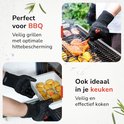 Zwarte handschoenen met siliconen noppen, gebruikt voor barbecue en het bereiden van eten in de keuken.