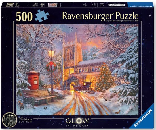 Puzzle de Noël Ravensburger 500 pièces 'Glow in the Dark' avec une église dans un paysage hivernal.
