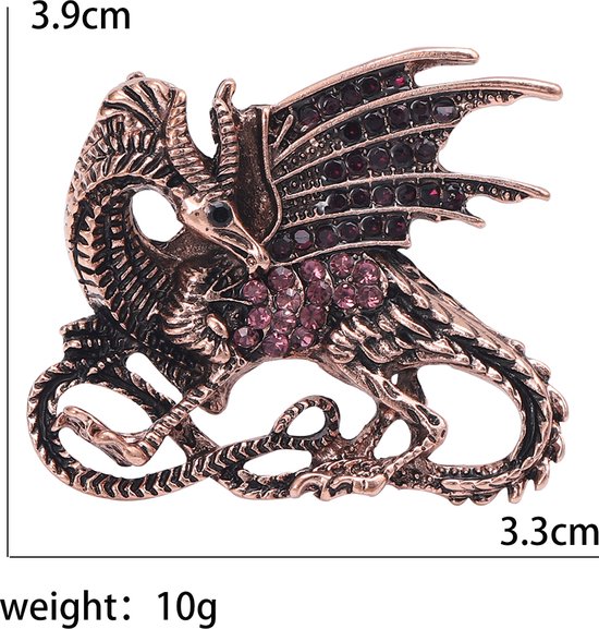 Broche dragon couleur cuivre avec zircons violets sur les ailes et le torse. Dimensions 3.9 x 3.3 cm.