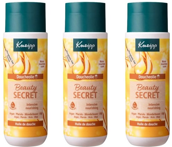 Drie gouden flessen Kneipp Doucheolie Beauty Secret naast elkaar. Elke fles heeft een bruin en beige label met informatie over de ingrediënten.