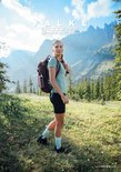 Vrouw in FALKE Ergnomic Sport System kleding in een berglandschap.