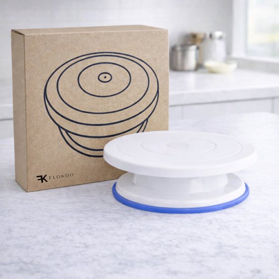 Wit draaibaar taartplateau met blauwe rand en kartonnen verpakking met Flokoo logo.