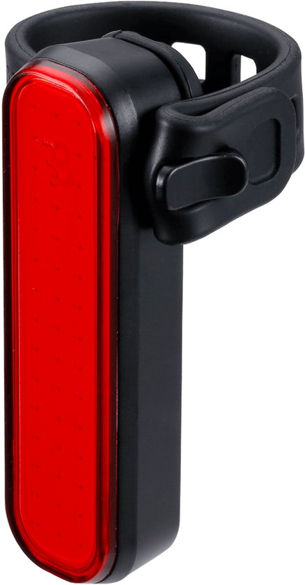 Un feu arrière de vélo rouge avec une sangle noire et une fixation en caoutchouc.