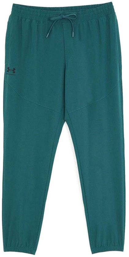 Smaragdgroene joggingbroek van Under Armour, opgevouwen, met trekkoord en logo.