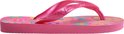 Tongs Havaianas roses avec imprimé floral et brides brillantes.