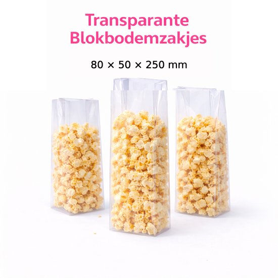 Drie transparante blokbodemzakjes gevuld met popcorn, maten 80 x 50 x 250 mm.