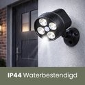 Zwarte, IP44 waterbestendige buitenlamp met vier LED-lampjes die schijnen in de regen.