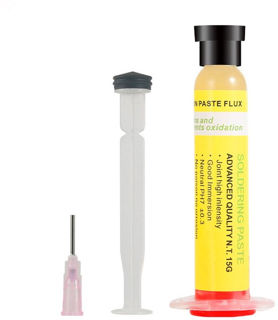 Buisje soldeerflux met gele dop, rode basis, spuit en naald. Tekst op buisje: "SOLDERING PASTE ADVANCED QUALITY N.T. 15G".