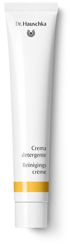 Witte tube met Dr. Hauschka logo, 'Crema detergente', 'Reinigingscrème', 'crème' en een gele band.