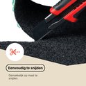 Un cutter coupe un tapis gris foncé, avec le texte 'Facile à couper'
