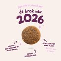 Eén Edgard & Cooper brok, omringd door tekst over vers vlees en vezelbalans.