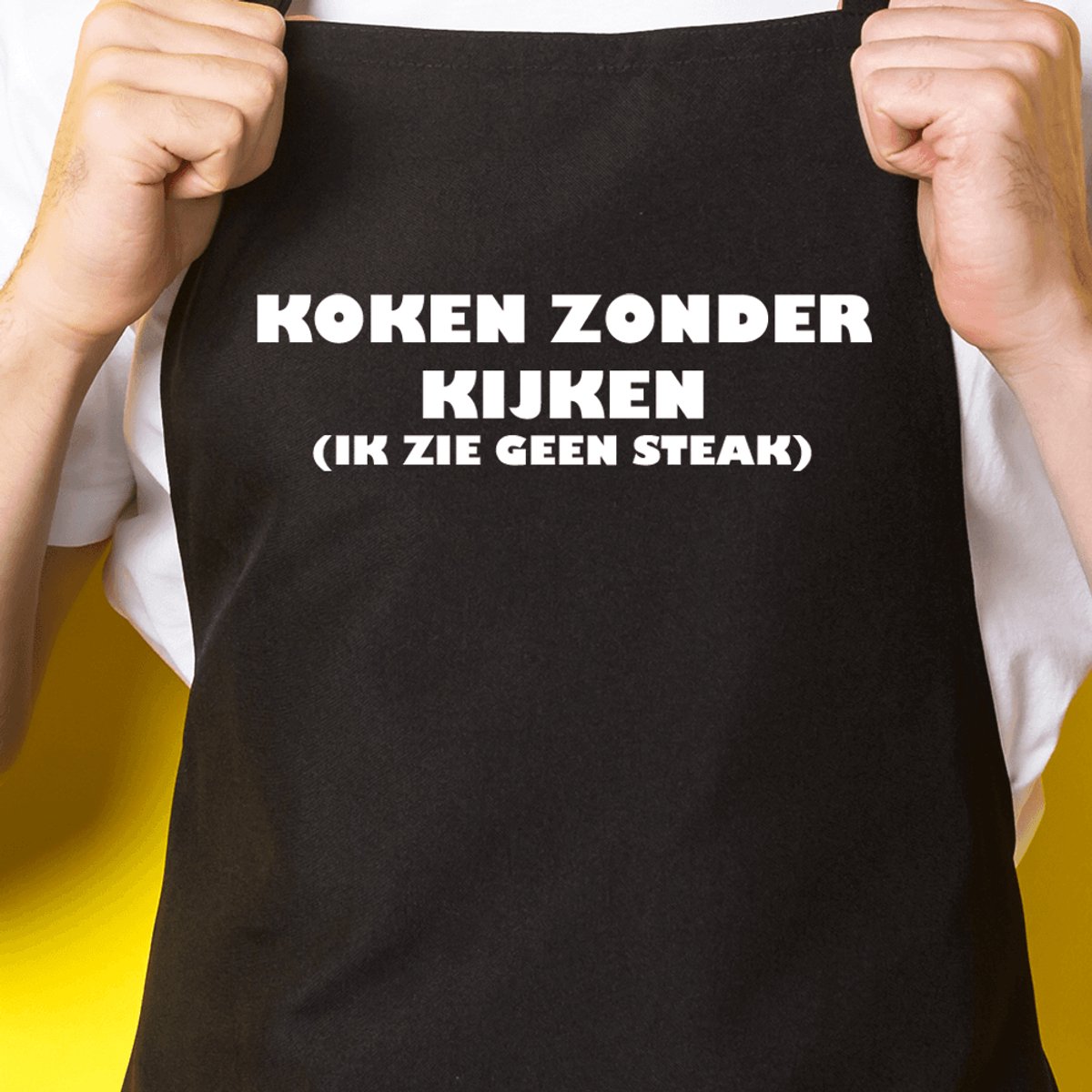 Zwart keukenschort / BBQ-schort met tekst | Koken zonder kijken - ik zie geen steak | Katoen - One size - Verstelbaar - Wasbaar - Cadeau voor hem - Vaderdag - Gratis verzending - Cadeau voor Kerst & sinterklaas | Incl. 2 jaar garantie