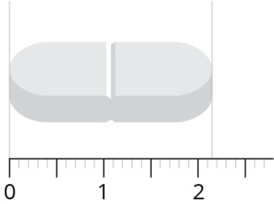 Wit, langwerpig tablet met een deel in het midden, gemarkeerd met een liniaal van 0 tot 2.