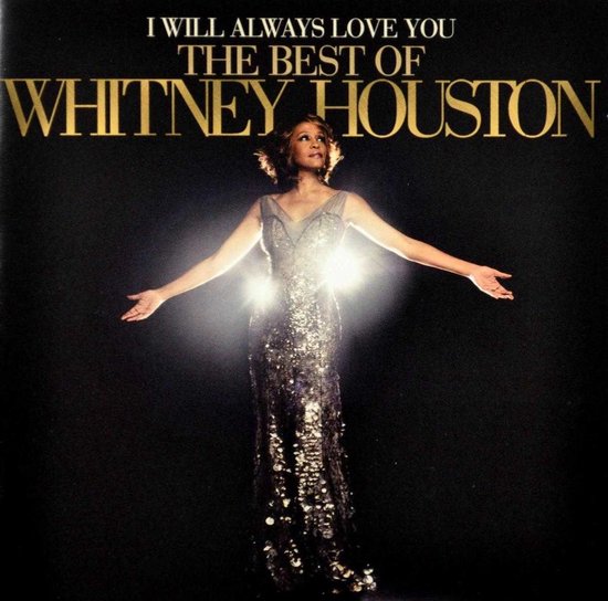 Whitney Houston in een glinsterende zilveren jurk met wijd open armen, met de tekst 'I Will Always Love You The Best Of Whitney Houston'.