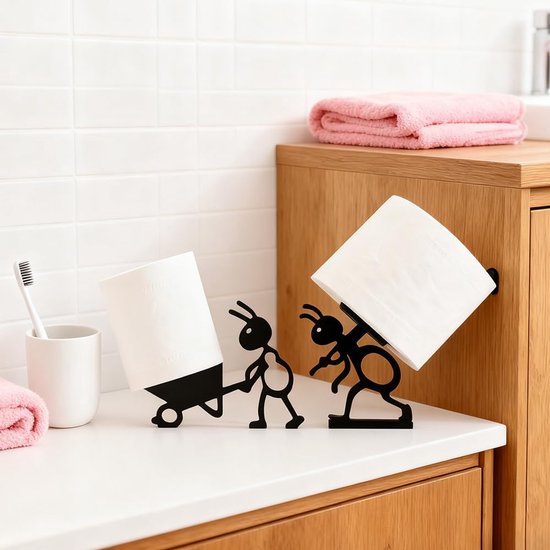Zwarte ant toiletrolhouders op een aanrecht met een rol toiletpapier. Eén rol wordt op de rug van een mier gedragen, de ander wordt in een kruiwagen geduwd.