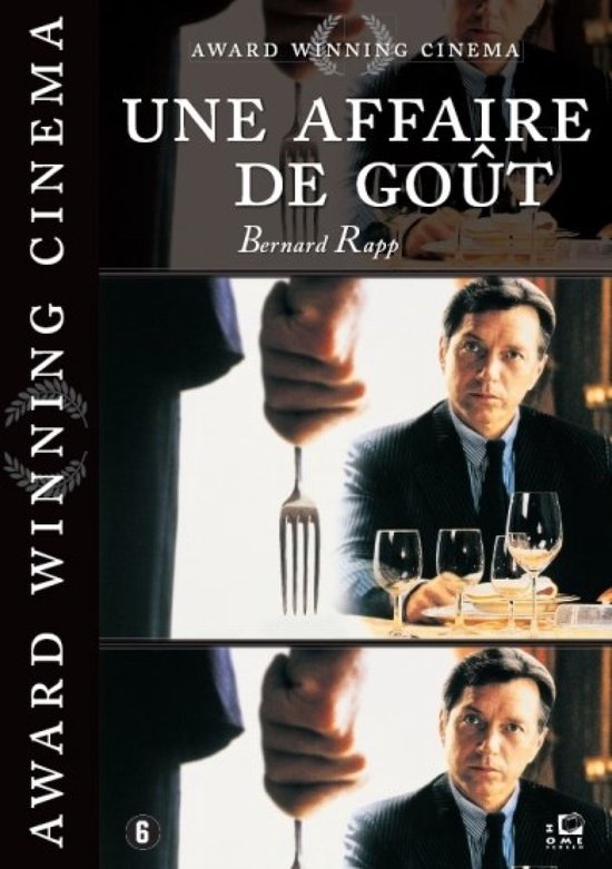 Film poster 'Une Affaire De Goût', met een man in een pak aan tafel met wijnglazen. Tekst: AWARD WINNING CINEMA, UNE AFFAIRE DE GOÛT, Bernard Rapp.