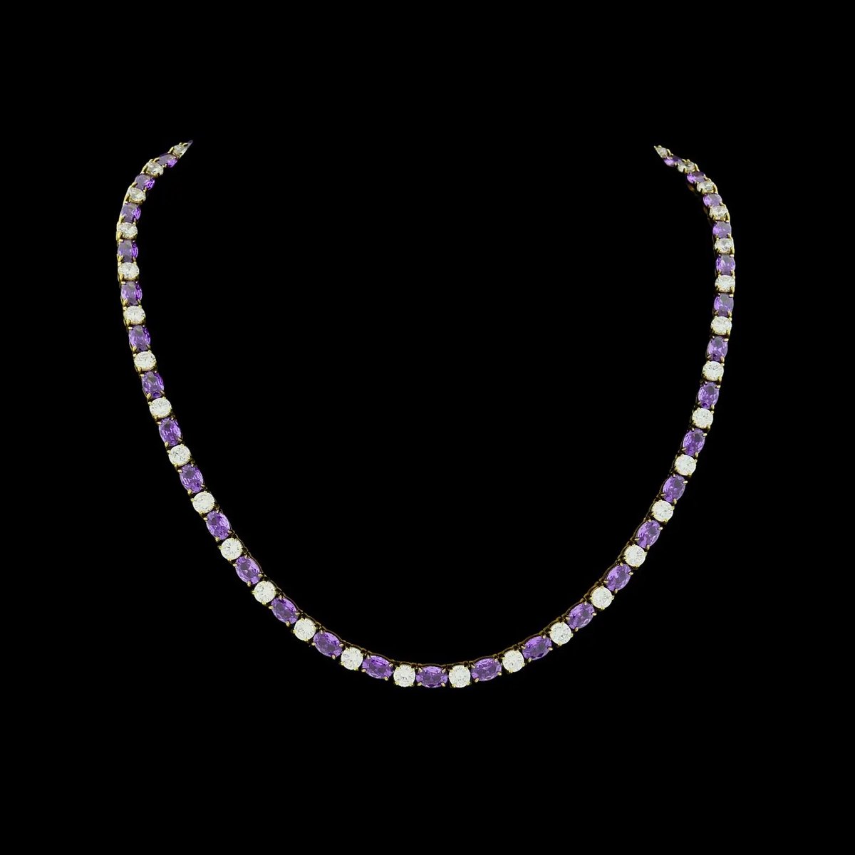 Victoria Valenza Goudkleurige RVS Tenniscollier met Paarse Zirkonia Stenen - Ketting - Goudkleurig - RVS - Tennisketting - Zirkonia